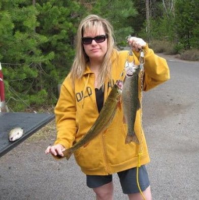 A woman holds trout caught in Central Oregon.