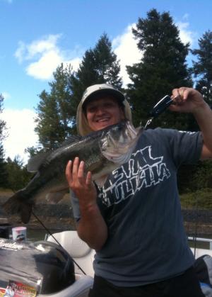 An angler holding a fish.