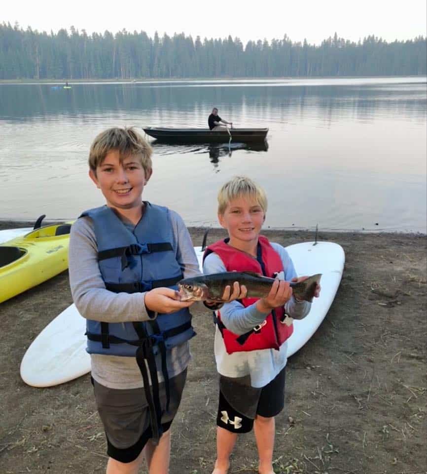 Two boys with trout caught at twin lakes oregon.