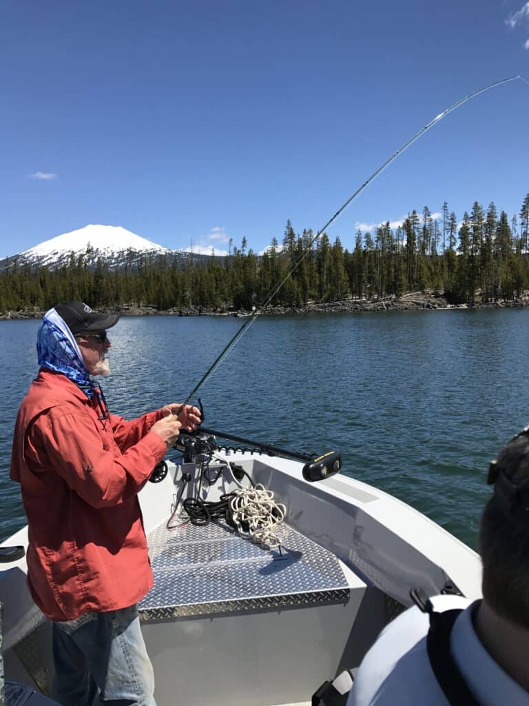 An angler fly fishing at lava lakes.