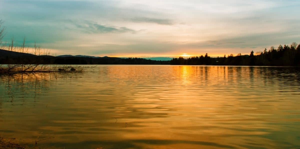 The sun setting over Alder Lake in Western Washington.