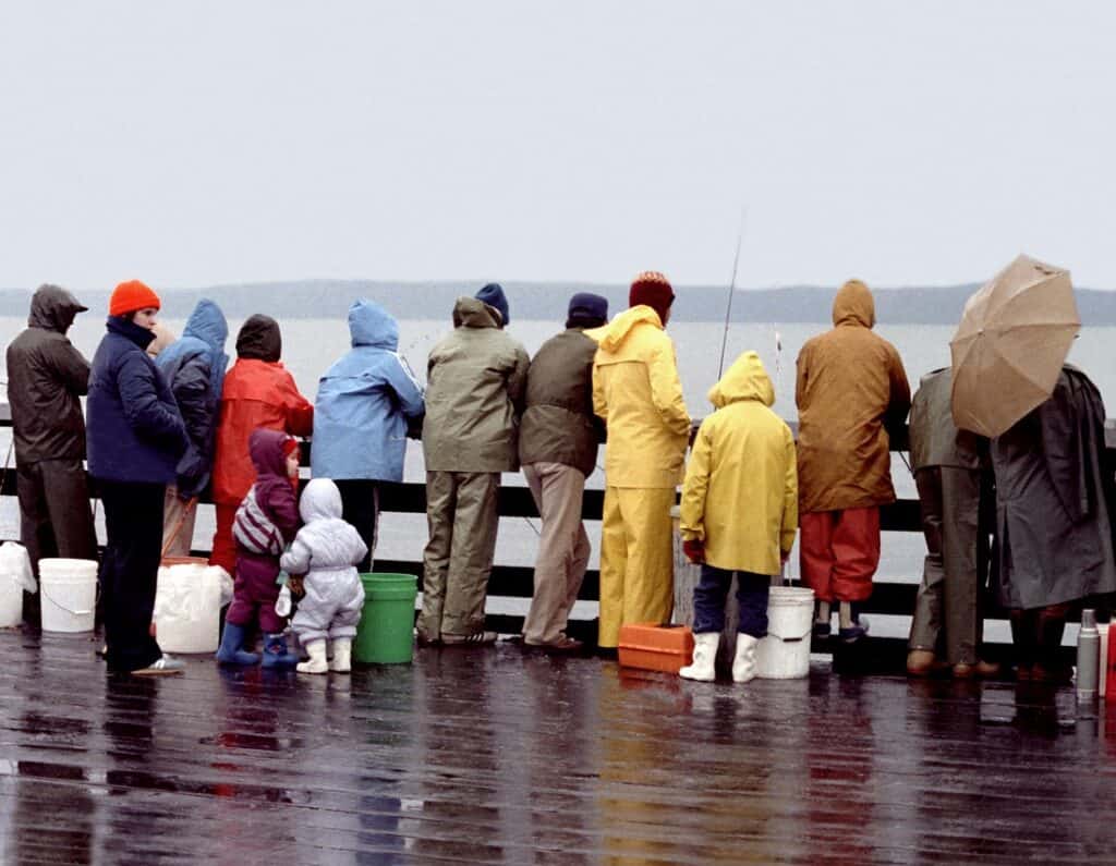 Anglers fishing from the des moines pier in king county.