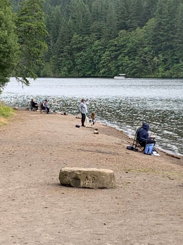 Anglers fish for trout from the bank at North Fork Reservoir.