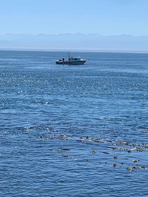 A fishing boat trying to catch salmon off san juan island washington.