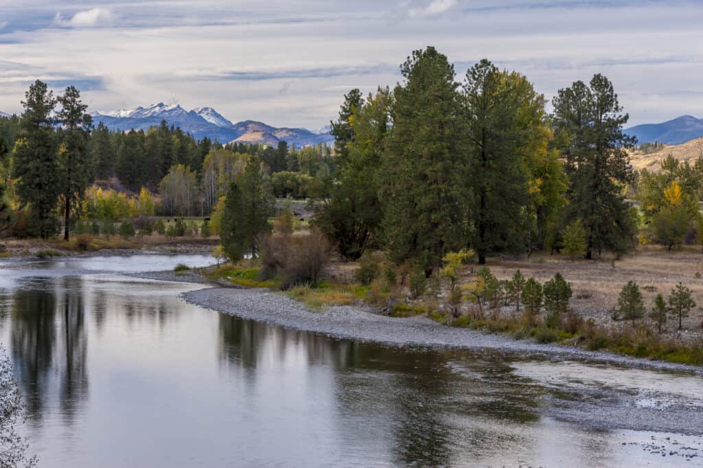 A scenic view of the Methow River flowing through a valley near Winthrop Washington.