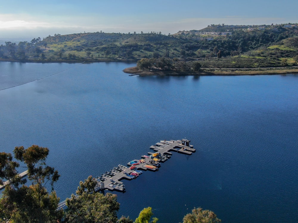 Fishing boats parked at a dock at Lake Miramar.