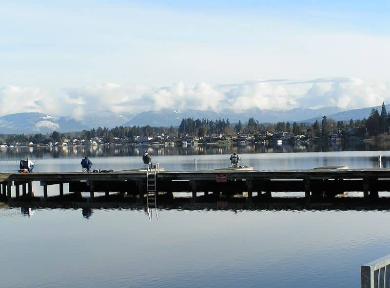 Anglers fishing from a dock at Lake Stevens, Washington.