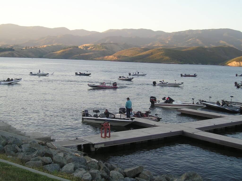 A cluster of fishing boats awaits the start of a Wounded Warrior fishing event at Castaic Lake.