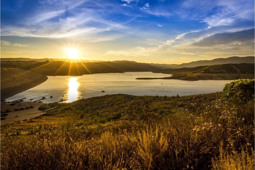 The sun sets over Castaic Lake, one of Southern California's premier fishing spots.