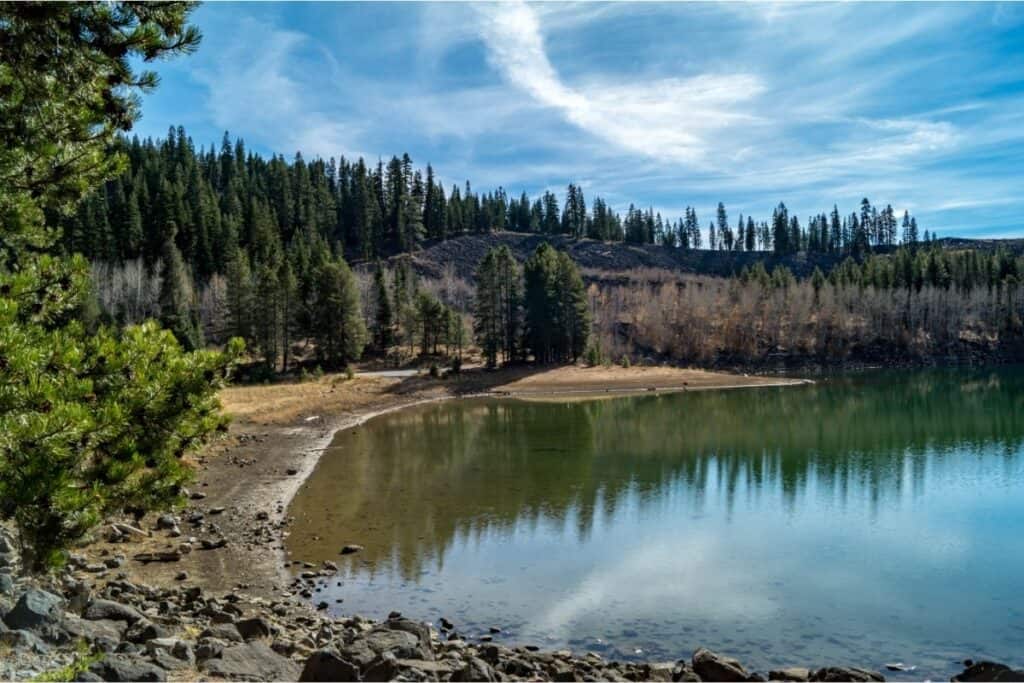 The shores of small Crater Lake in the high country of Lassen County.