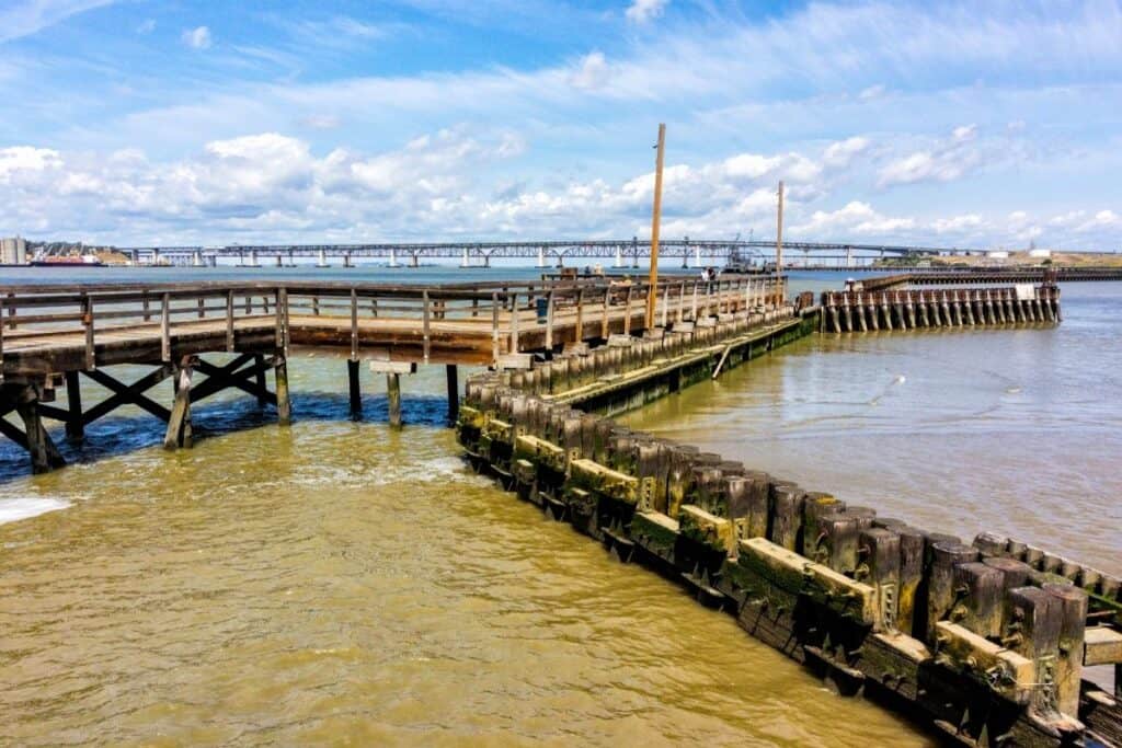 The Martinez Pier with bridge in the background.