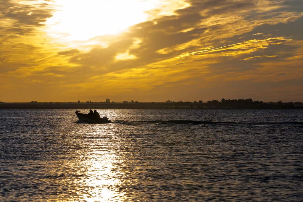 Fishing Boat on Moses Lake at Sunrise.