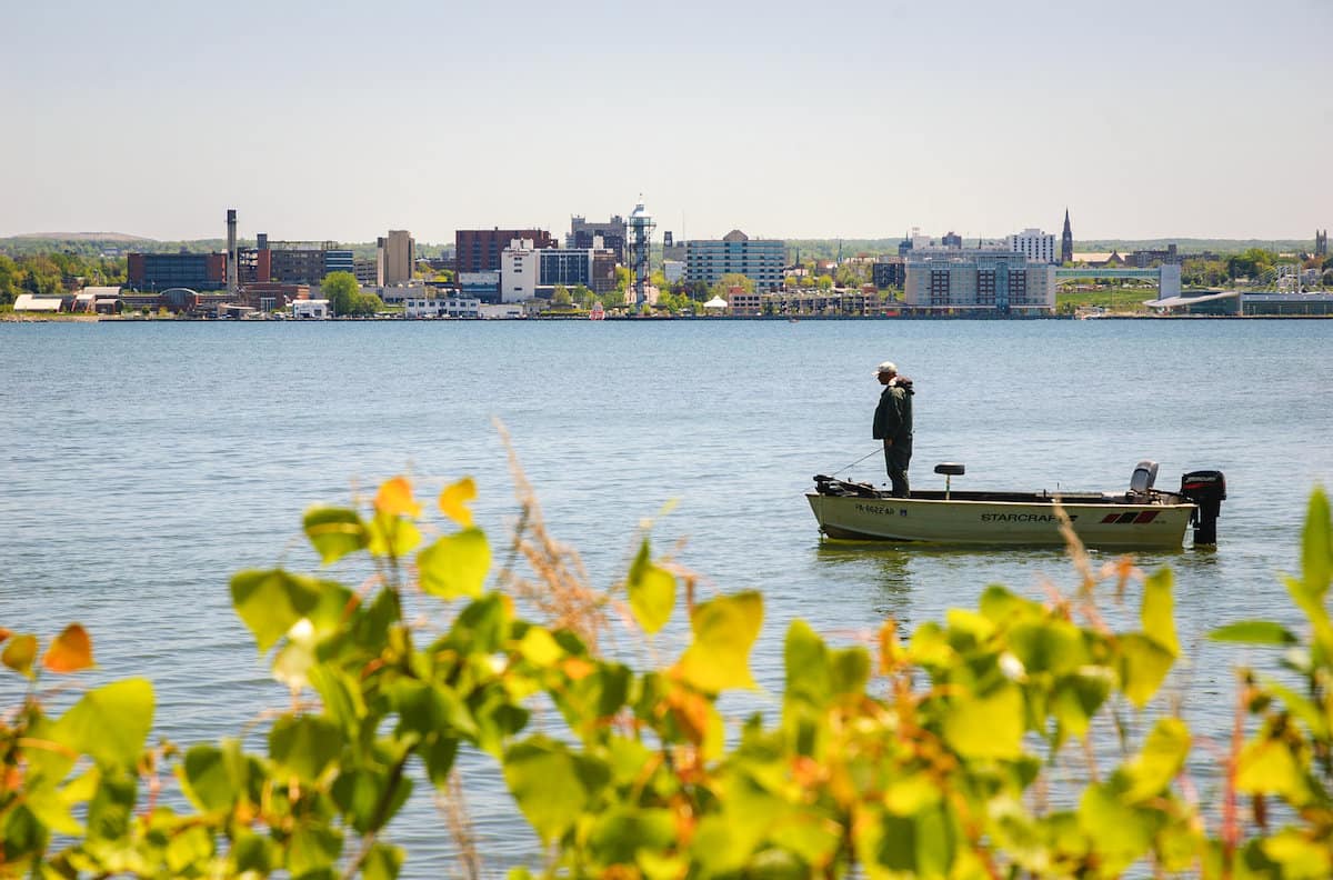 An angler fishes near the state park in Presque Isle Bay, a great place to catch northern pike and other big fish.