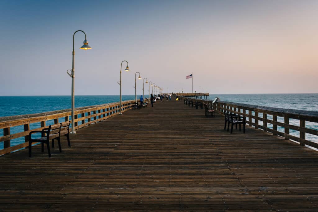 View down the fishing pier in Ventura, California.