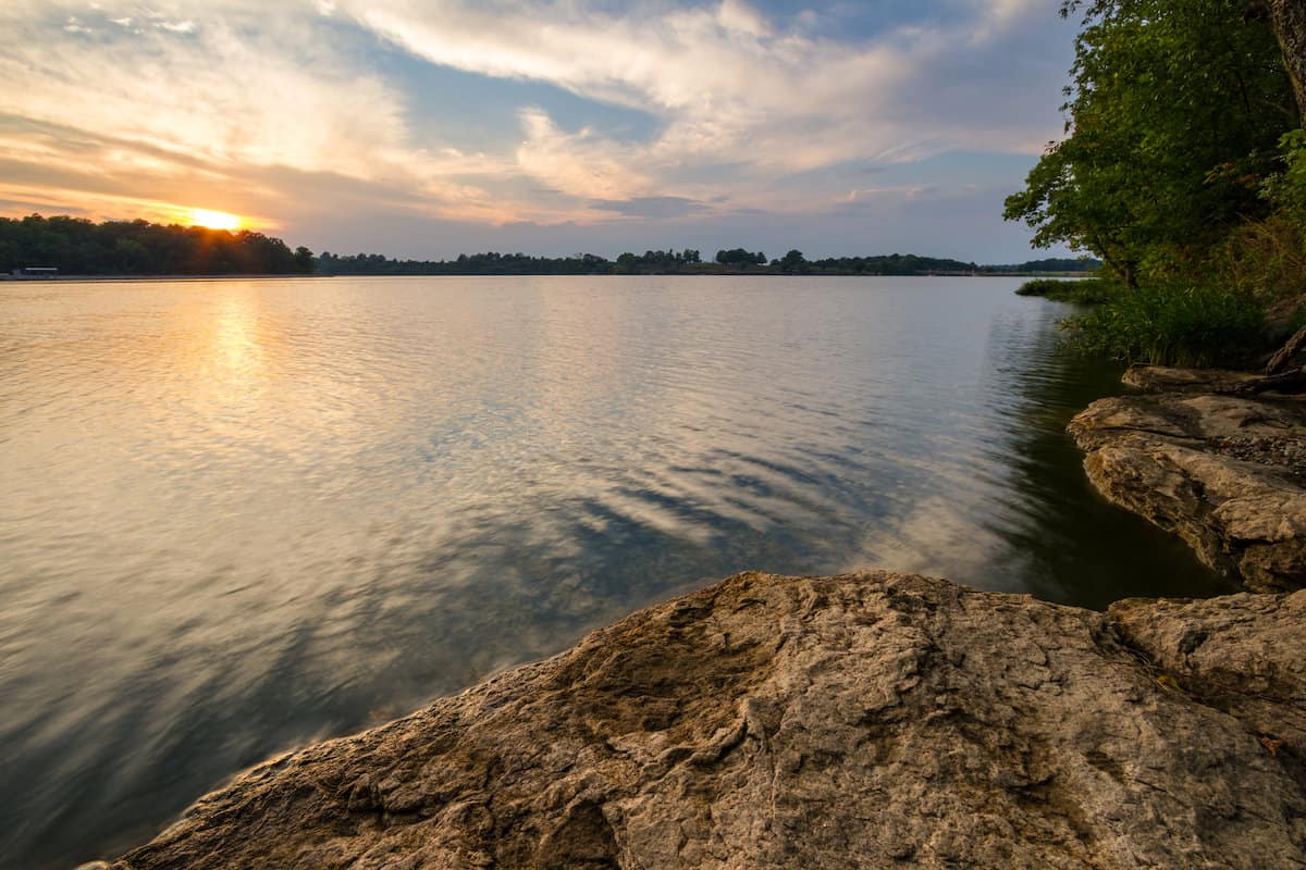 Sun setting over Lake Jacomo in Missouri at a perfect time of day to go bass fishing.