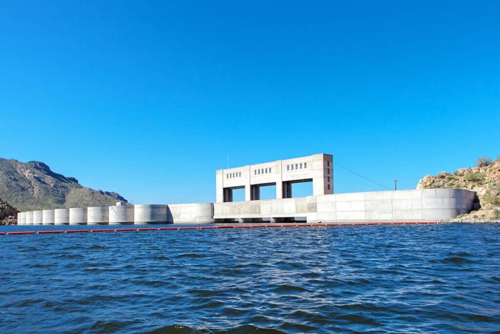 A dam used to form Bartlett Lake, one of the top fishing spots in Central Arizona.