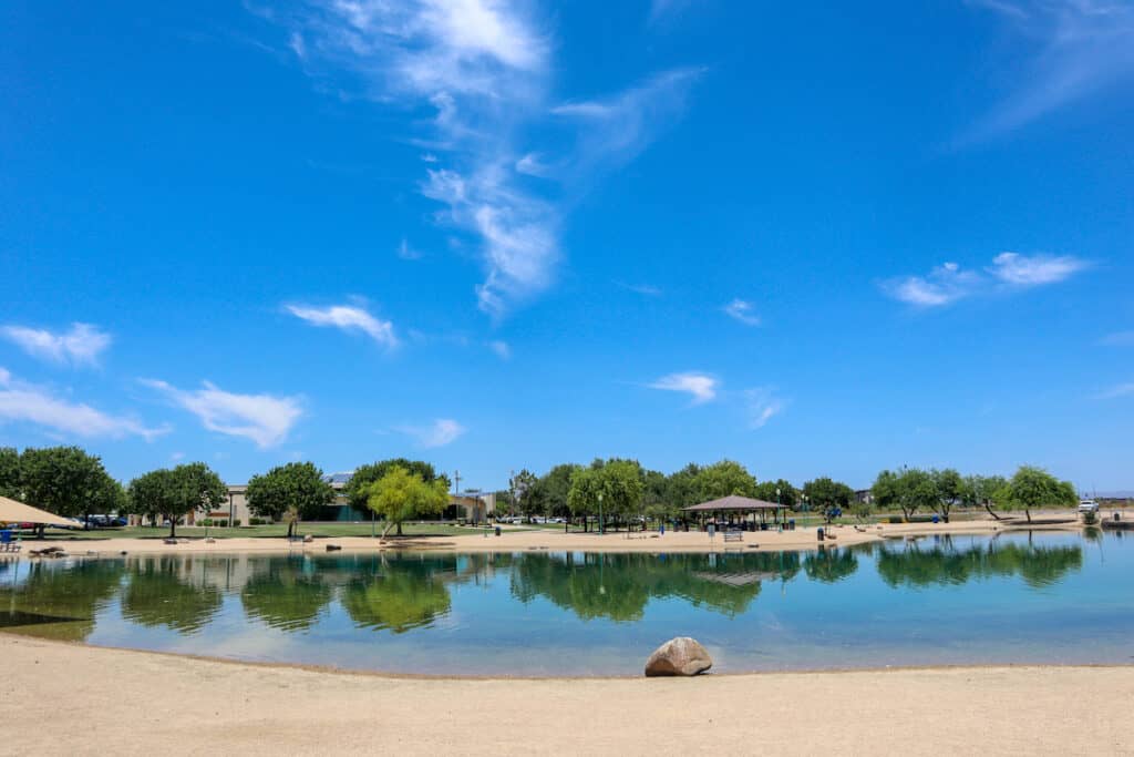 View from the shoreline of Surprise Park Lake in a city park in the community of Surprise near Phoenix, Arizona.