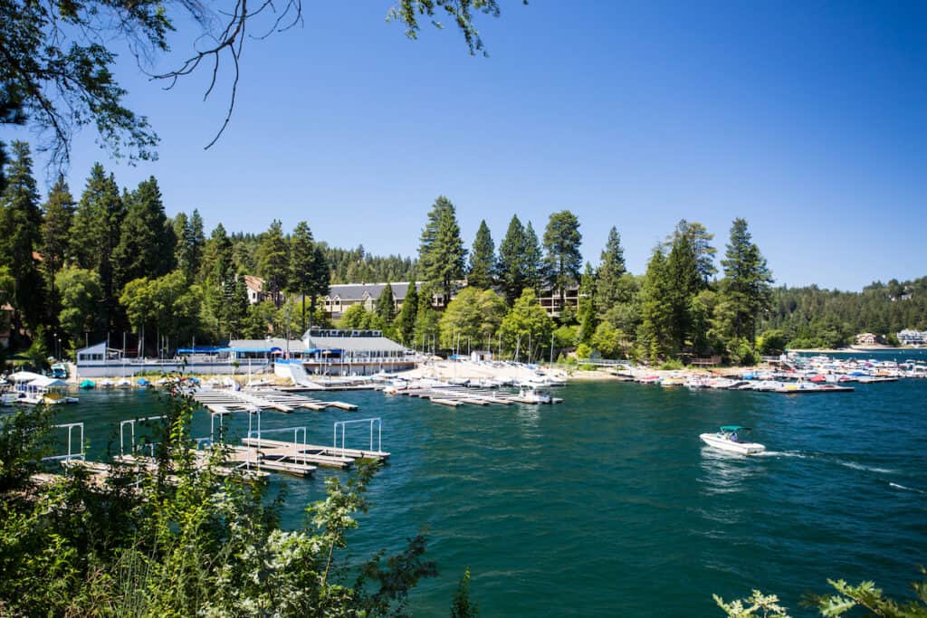 A boat motors toward the docks at Lake Arrowhead.