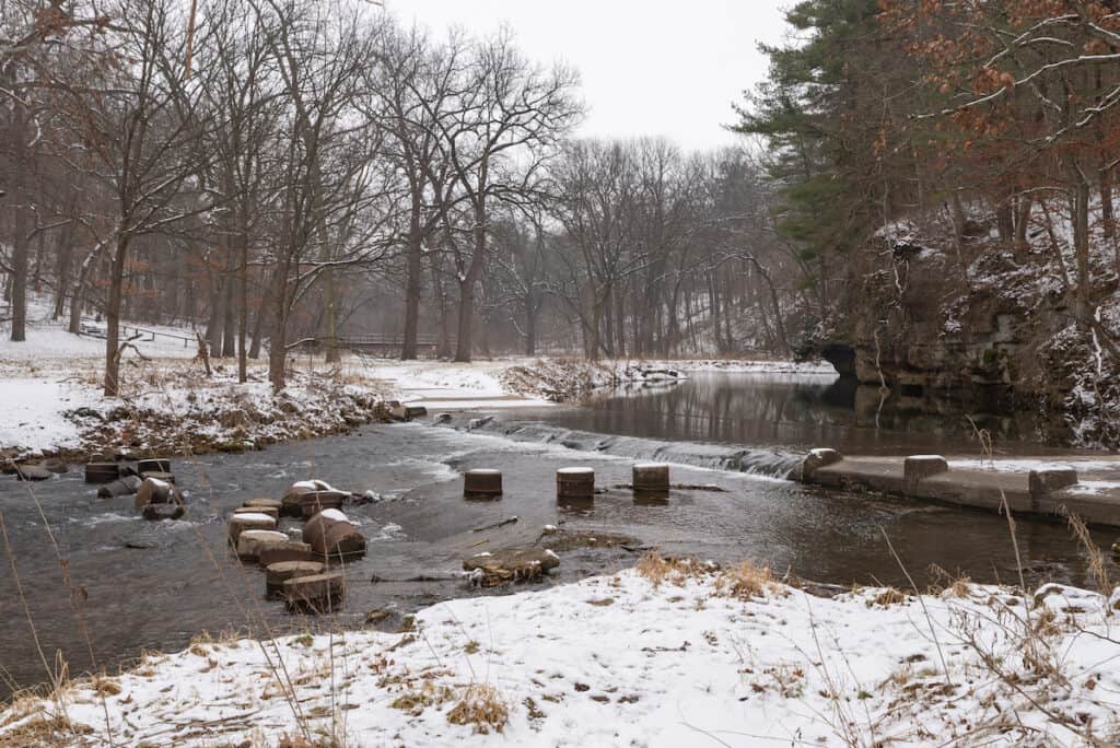 Pine Creek flows through White Pines Forest State Park on a snowy winter morning in Ogle County, Illinois.