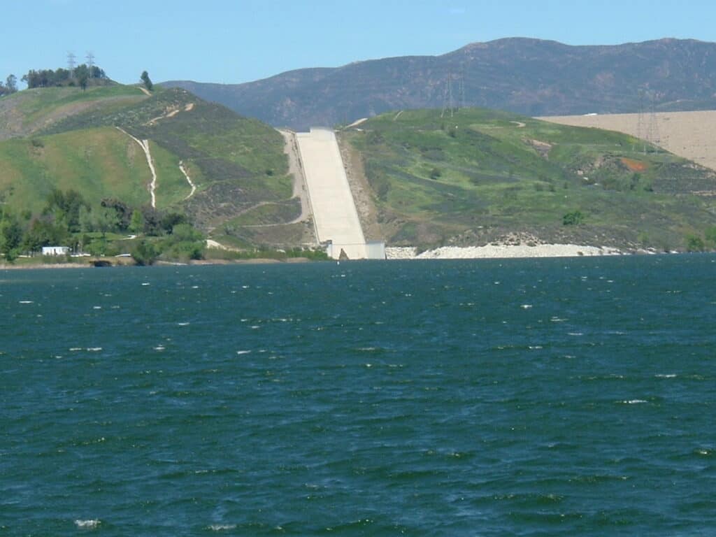 The spillway from the main Castaic Lake into Castaic Lagoon shown in the foreground.