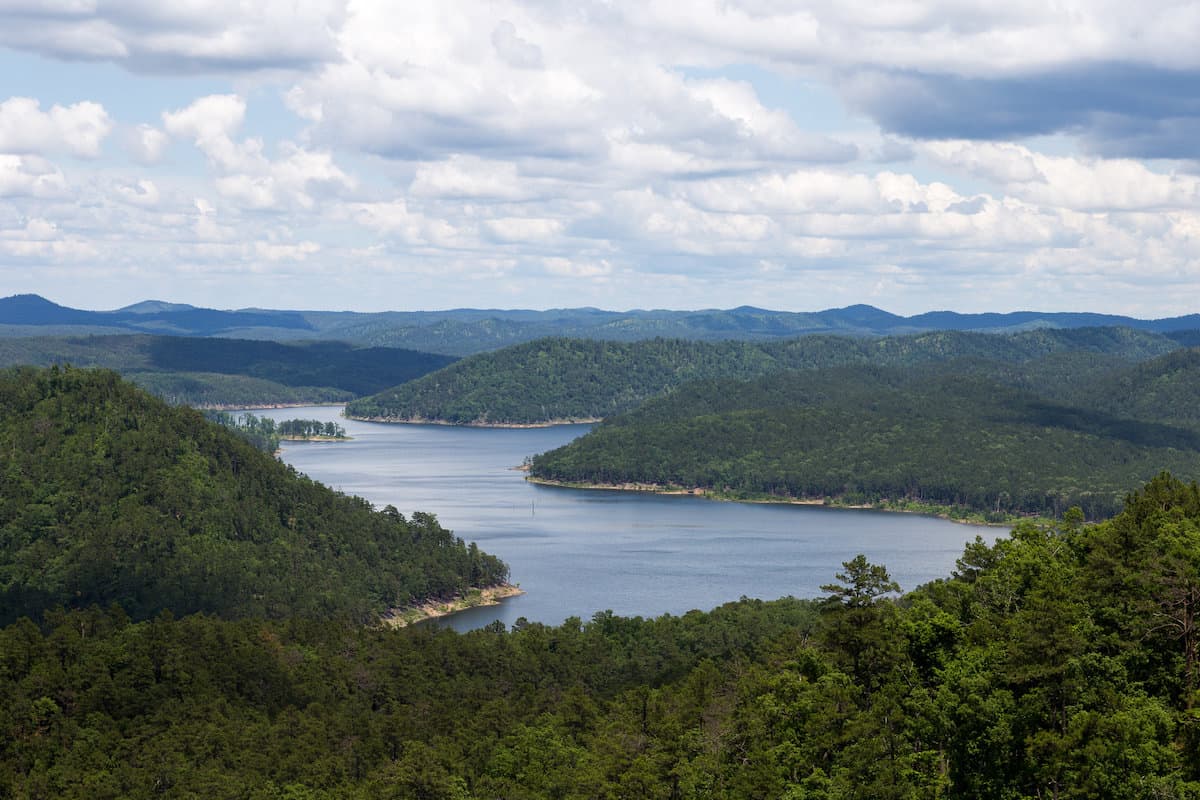 A scenic view of Broken Bow Lake, one of the best fishing spots in Oklahoma.