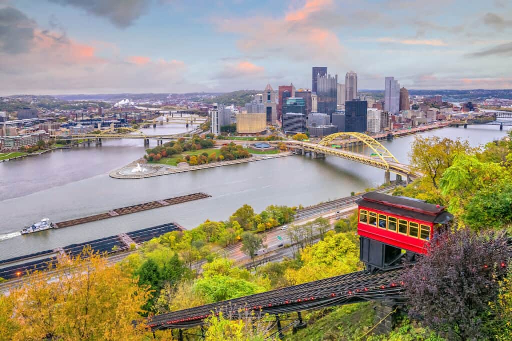 Overview of downtown Pittsburgh skyline including popular Ohio River bank fishing spot Point State Park.