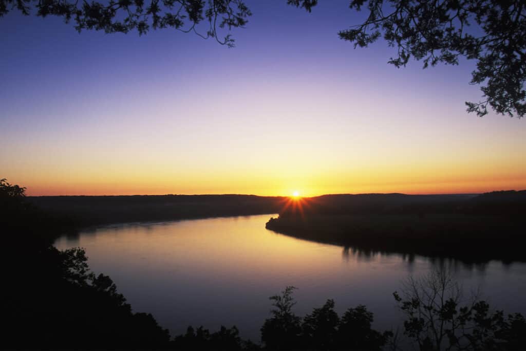 Beautiful sunrise over the Ohio River as seen from Otter Creek Start Park, Kentucky, across from Indiana on a great stretch for fishing.