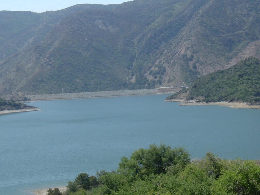 Overview of Pyramid Lake including its massive dam that created this popular fishing reservoir in the hills above Los Angeles.