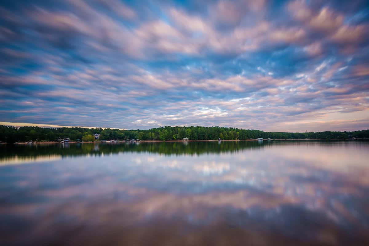 Darkening sky and calm water of Lake Norman at sunset makes for a peaceful fishing time.