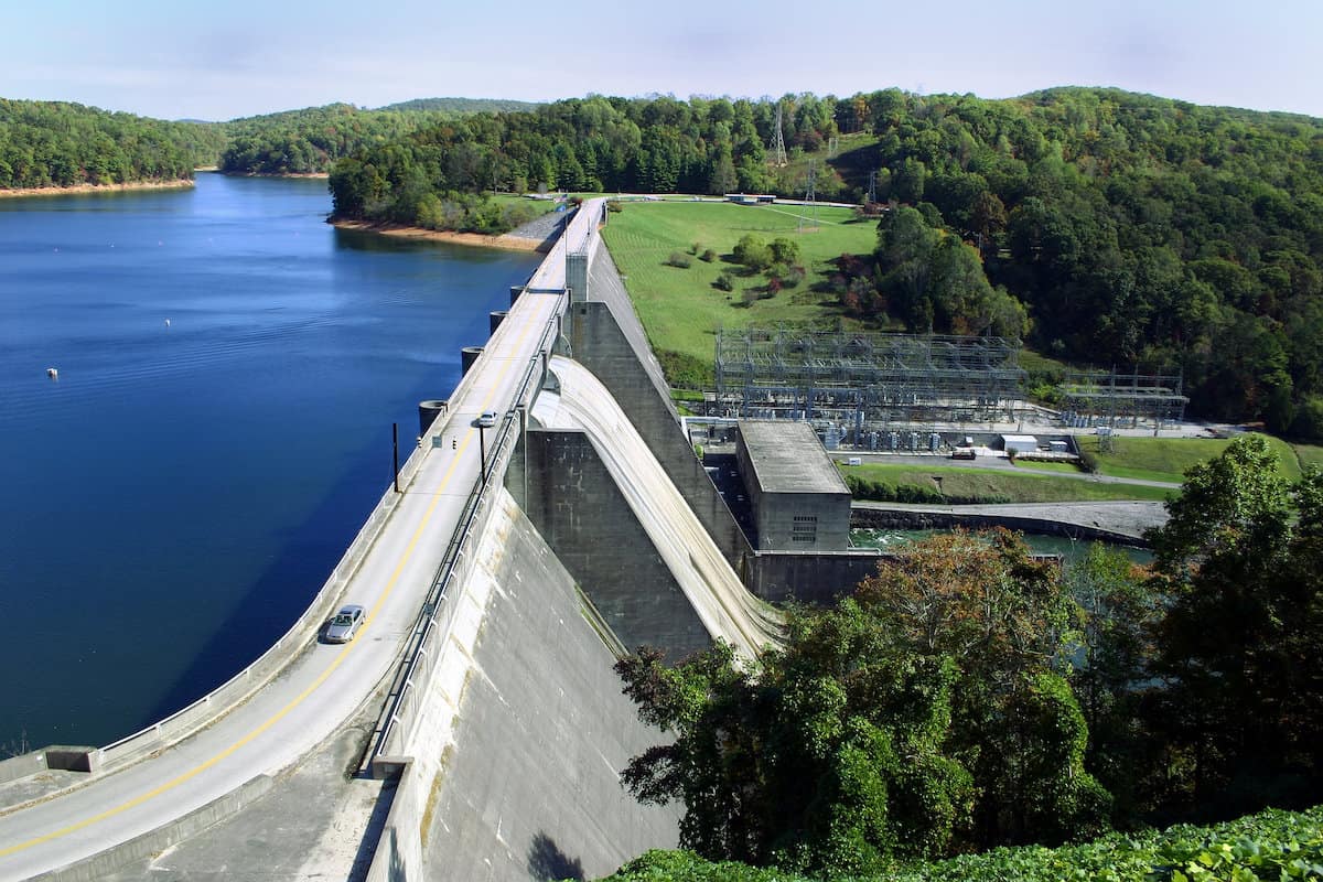 Norris Dam separates the blue fishing waters of Norris Lake and the green landscape of northeastern Tennessee.