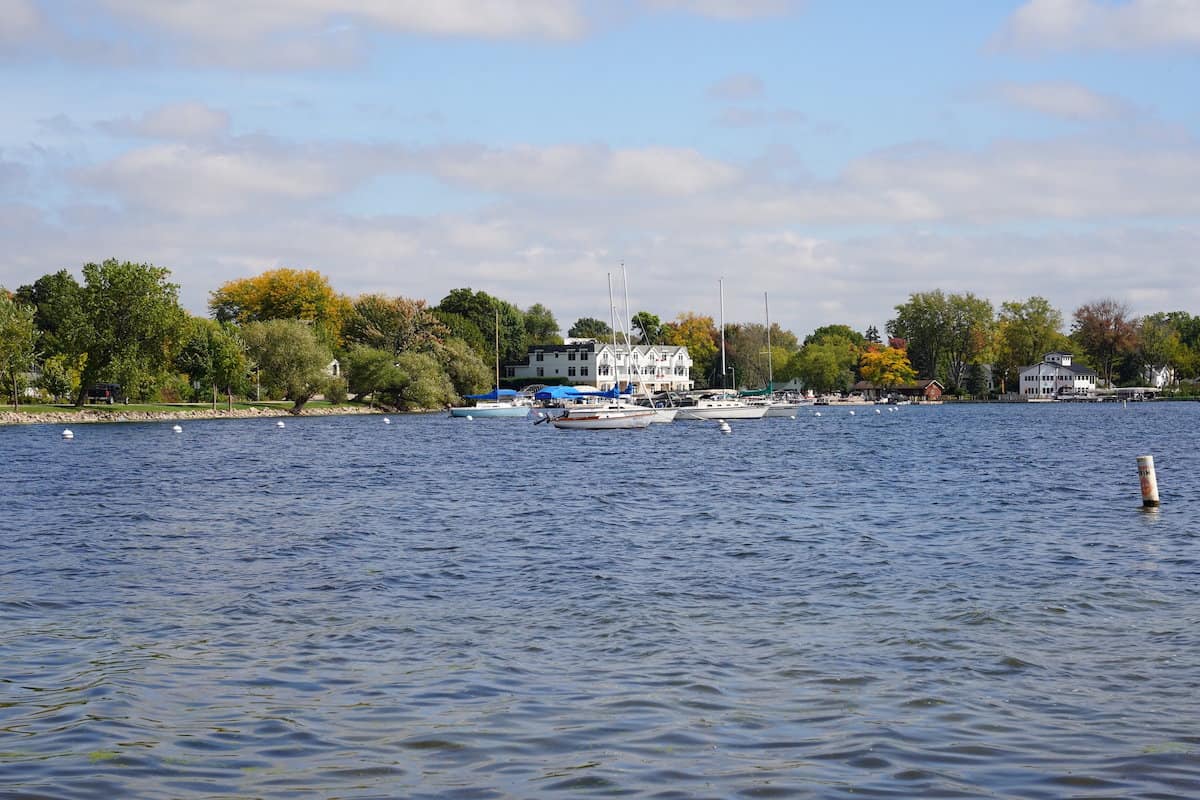 Scenic view of boats at Green Lake, one of Wisconsin's best walleye fishing spots.