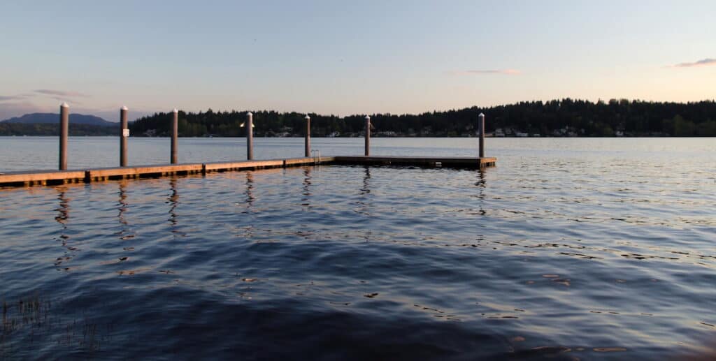 Sunset lights on a dock at Sammamish Landing near Marymoor park in Redmond, Washington.
