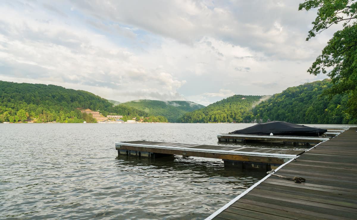 A covered boat sits in a boat dock at Cheat Lake, a good crappie fishing spot in West Virginia.